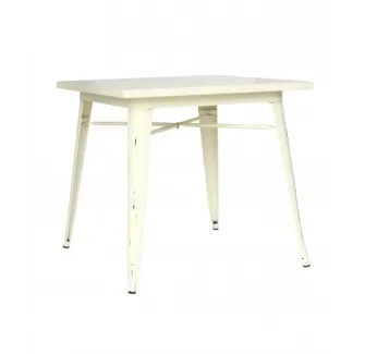 Une belle table vintage en métal peint coloris crème